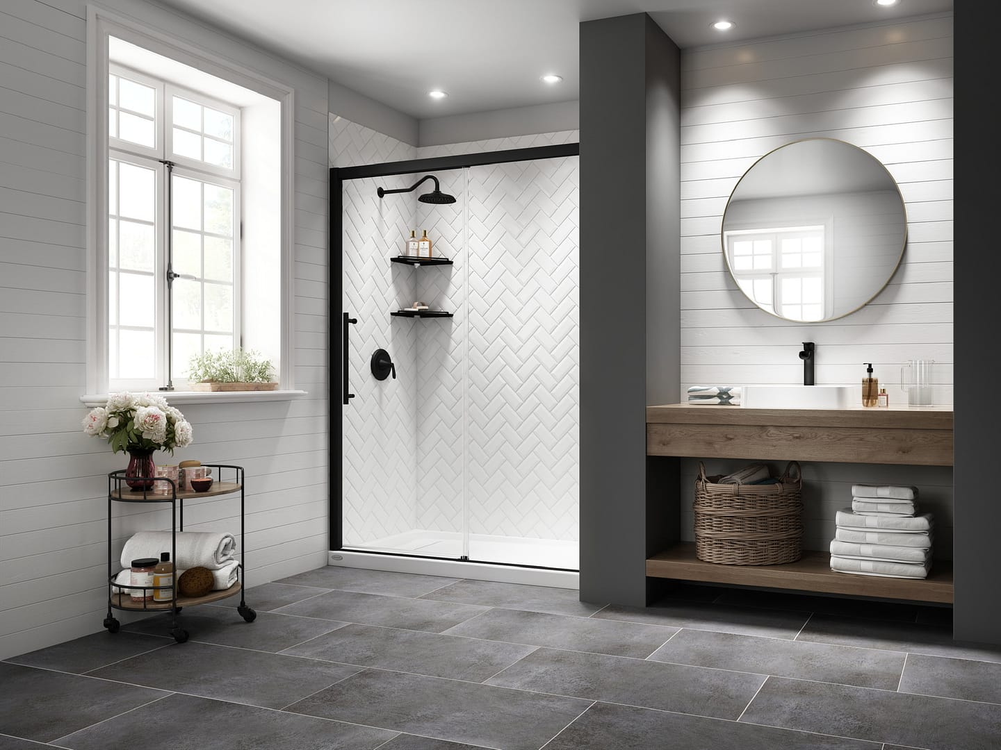 Walk-in shower with a matte black rain shower fixture and sliding glass door. Modern, elegant white herringbone walls.